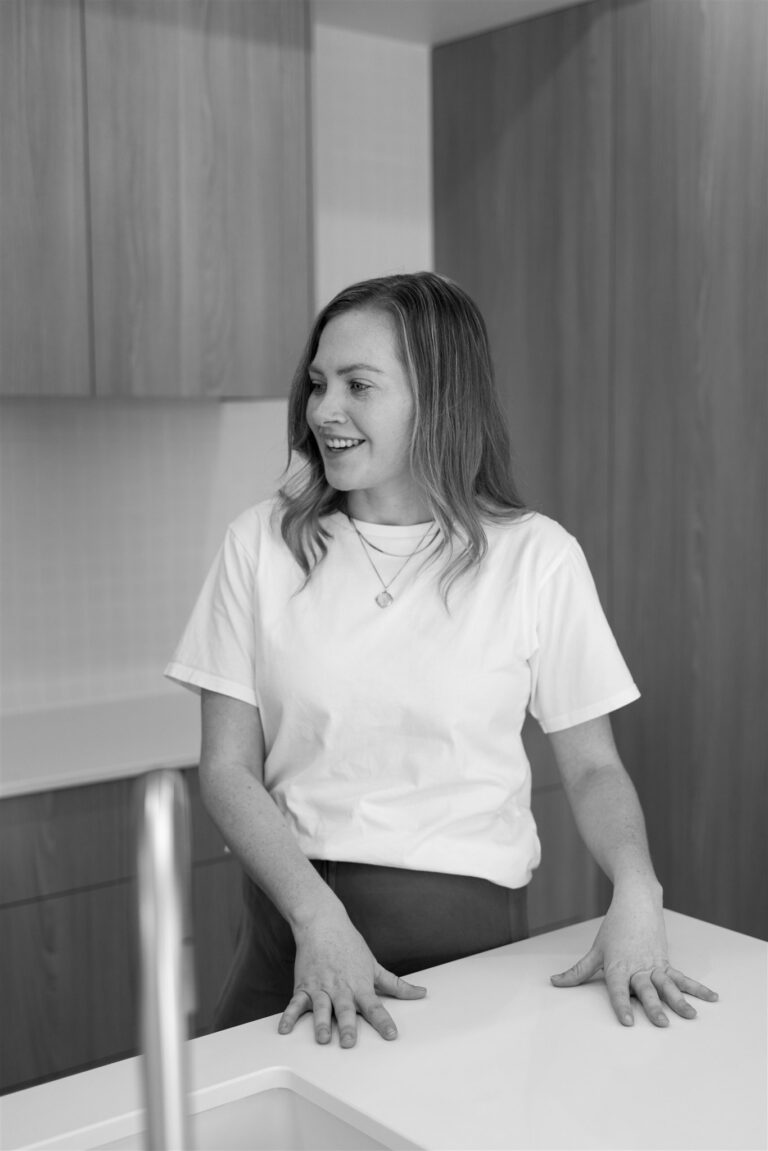 a Leah Jay property manager in black and white photo